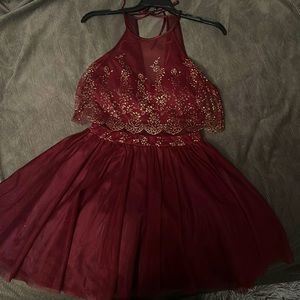 Maroon dress with gold glitter design. Two piece but connect with mesh material